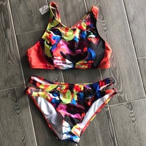 Very unique, with tags, never worn, bikini!